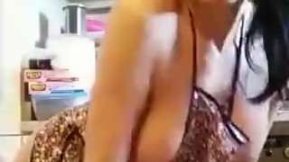 Sexy wife playing at kitchen